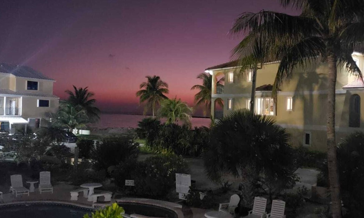 Bahamas Terrace Condo | 2-bedroom condo in oceanfront complex in Freeport with pool, WiFi, beach chairs.