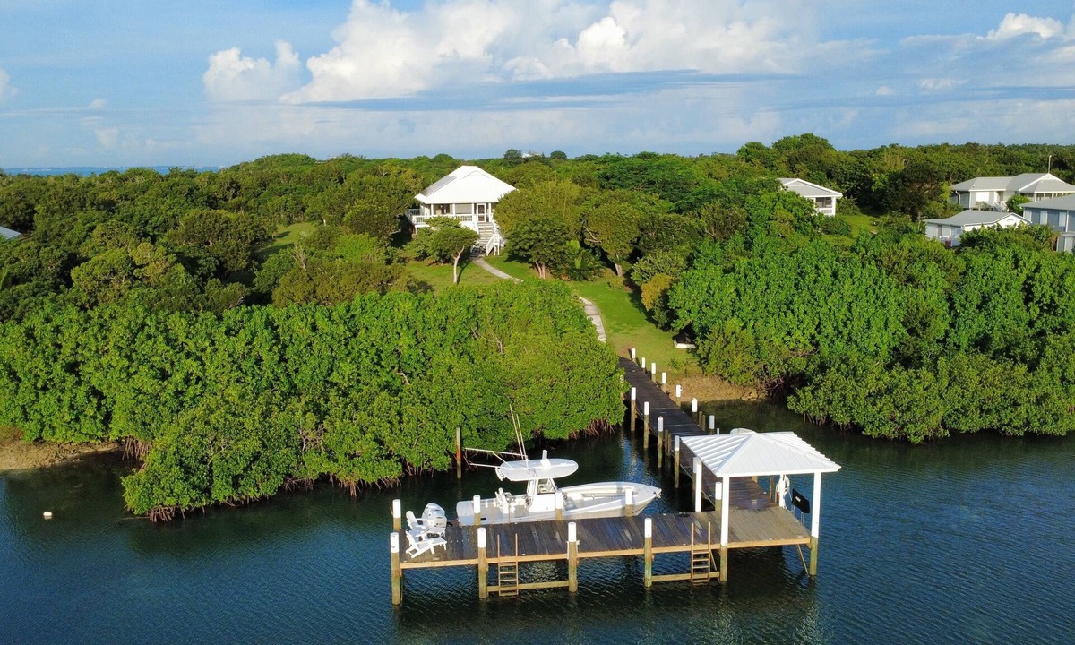 Hope Town House | A boater's dream home with a private dock UP THE CREEK from Hope Town Harbor.