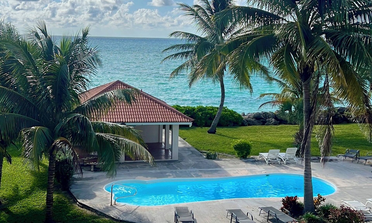 Williams Town House | Beachfront 2BR Coastal Townhouse with Pool, Ocean Views & Beach Access