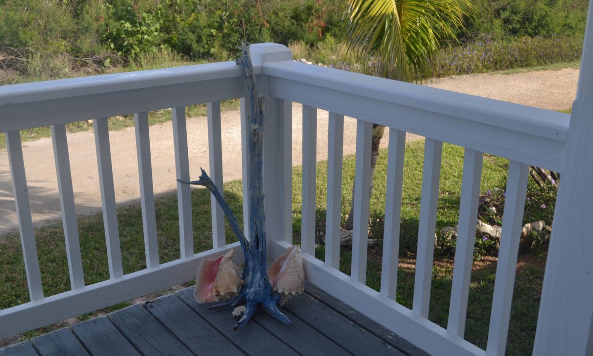 Clarence Town Cottage | Beautiful verandah style house just one minute from the ocean,