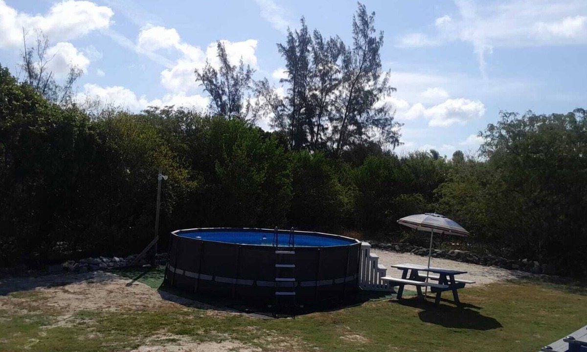 Farmer's Hill House | Centrally located family oriented near grocery store, airport, and beach
