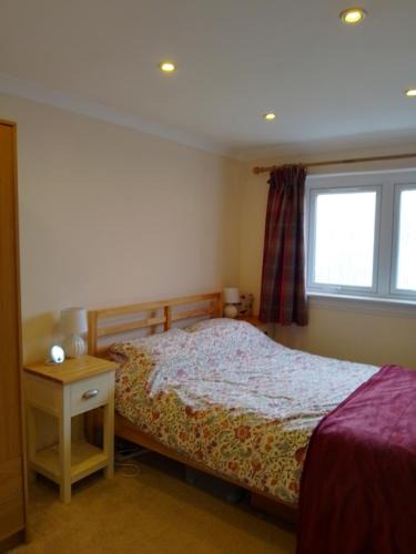 Longcroft House | Comfortable room with en suite