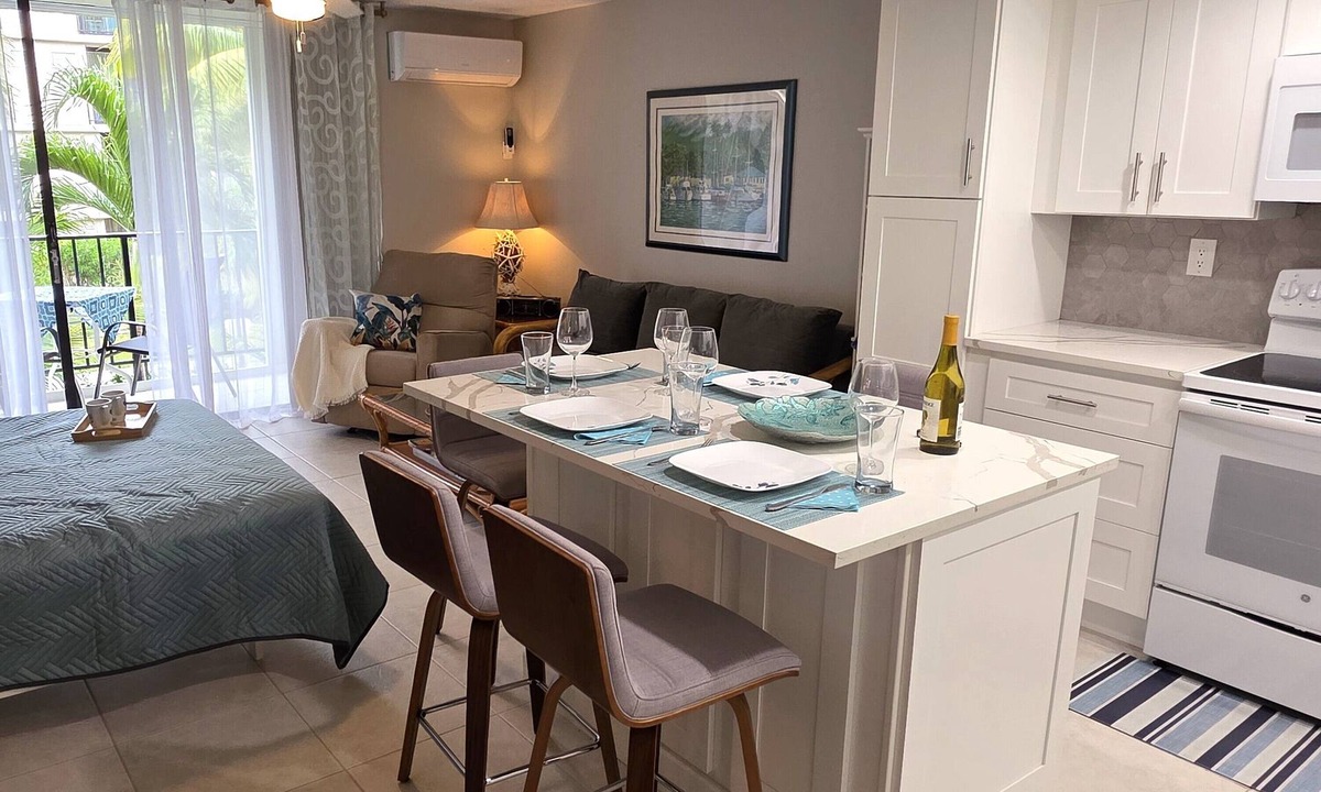 Williams Town Condo | Coral Beach Private Modern Beachfront Condo