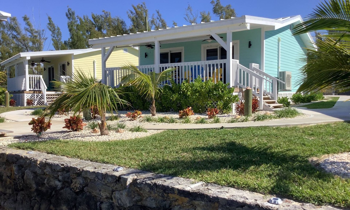 Bahama Reef Apartment | Cozy private green studio cottage on water free floating dock at your doorstep