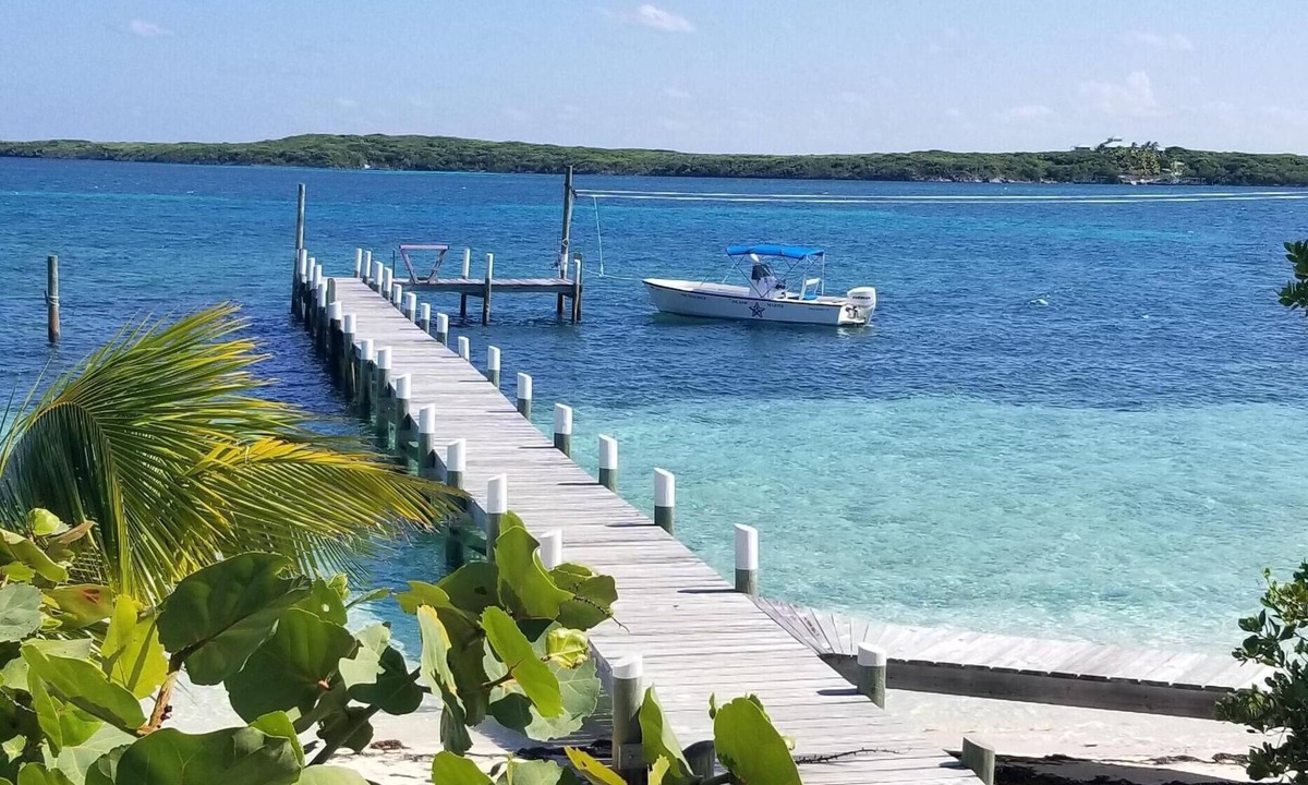 Lubbers Quarters Cay House | Green Bananas Cottage with sandy beach and private dock. Completely rebuilt.
