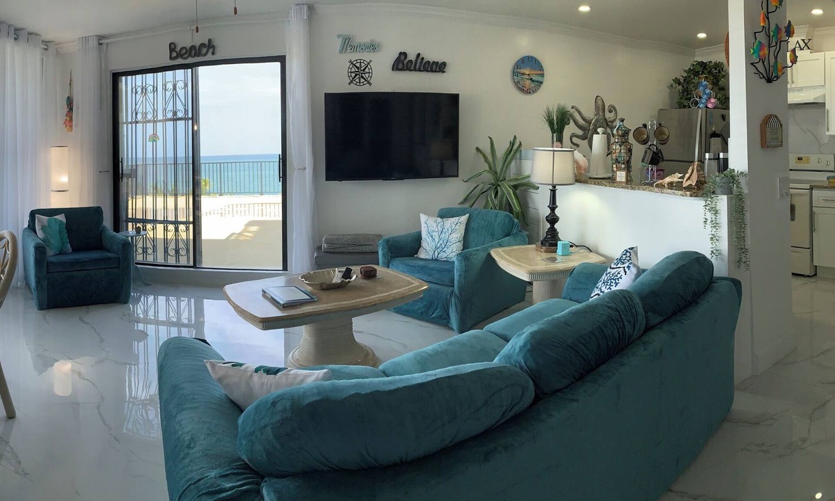 Williams Town Condo | Luxurious Beachfront Condo with Breath Taking Ocean, Beach and Garden Views.