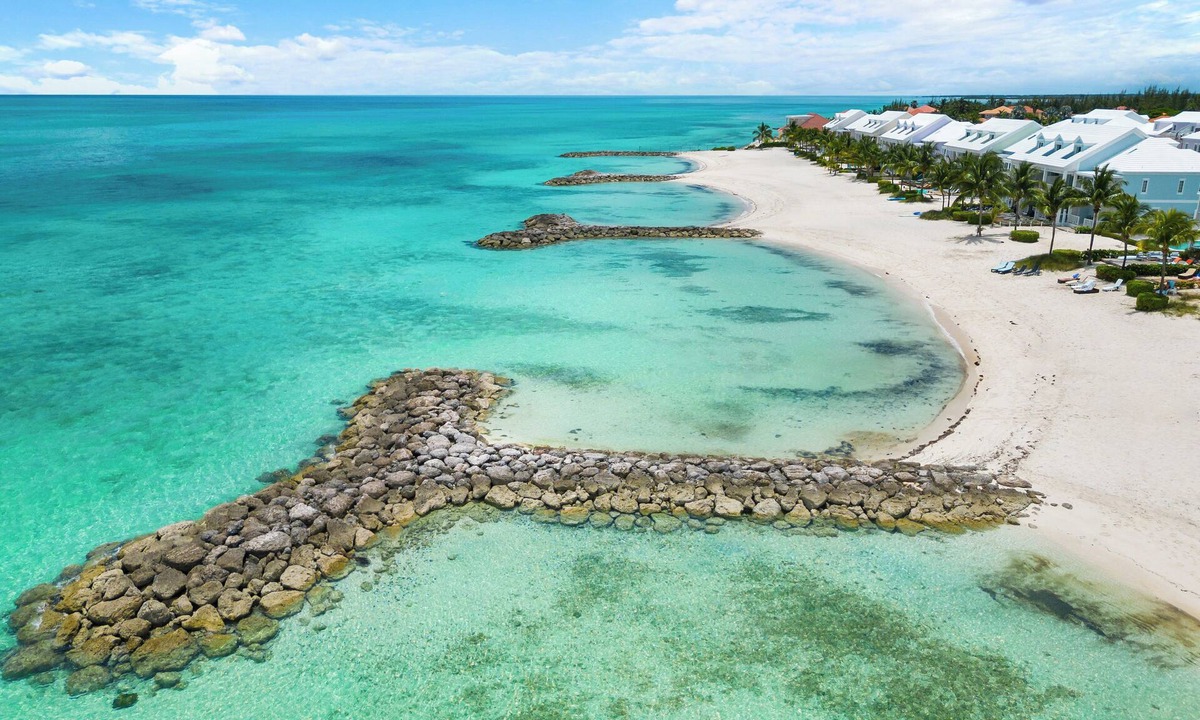 Nassau House | Luxury Beach side escape, steps from private beach, restaurant, marina, and café