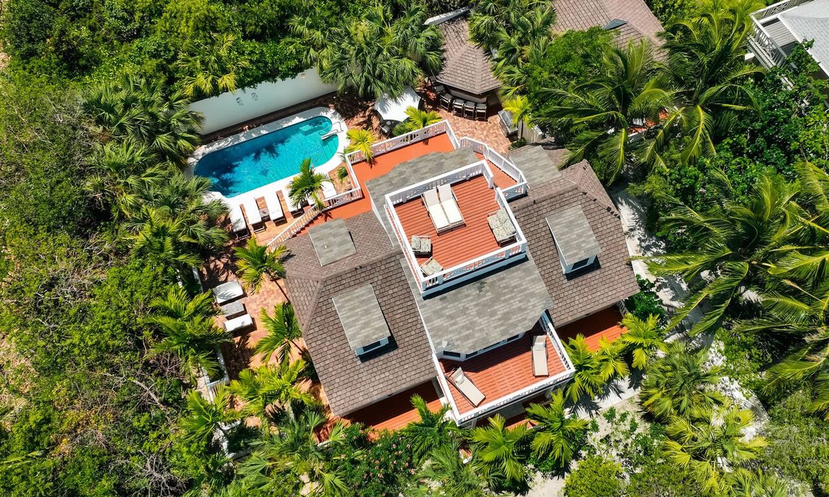 Dunmore Town House | Luxury Island Beach House with Private Pool Oasis