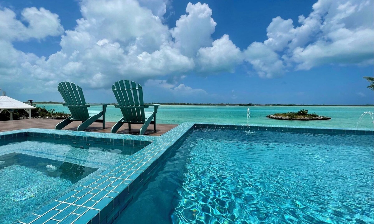 Hartswell House | New 5 BR Luxury Home with Dock, Pool, Spa & Beach on Moriah Harbour