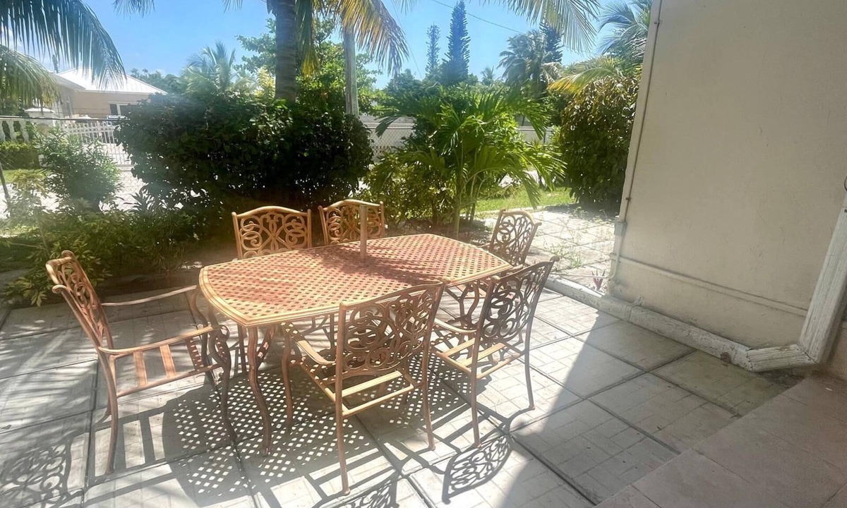 Williams Town Condo | Sandy Beach within minutes from your private garden patio