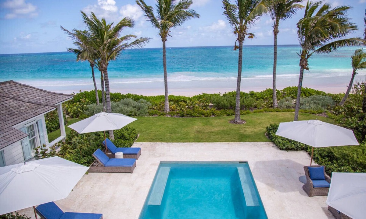 Dunmore Town Villa | Sitting Pretty - Private Beachfront Retreat Fully Staffed with Chef