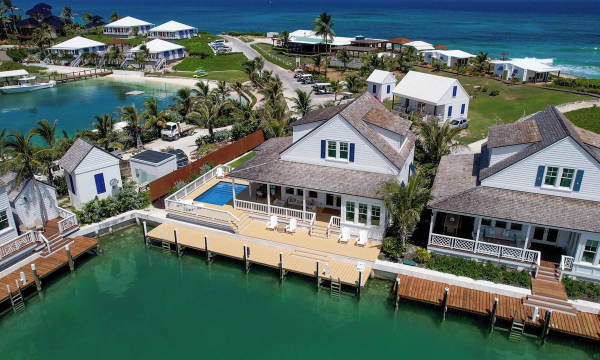Hope Town Resort | South End Villa on the Water: Lovely Pool, Expansive Decks, and 60’ Private Dock