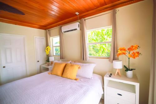Nassau House | Tangerine Sunsets Tuscany Cottage