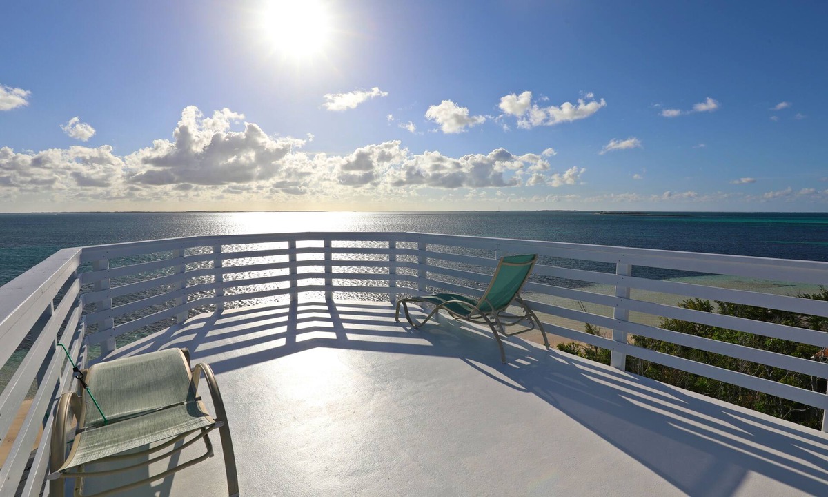 Hope Town Villa | Topside - Kick back and relax in your tropical hideaway by the sea!
