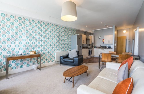 Torquay City Centre Cottage | 12 Astor House - one bed garden apartment with patio and stunning uninterrupted sea views