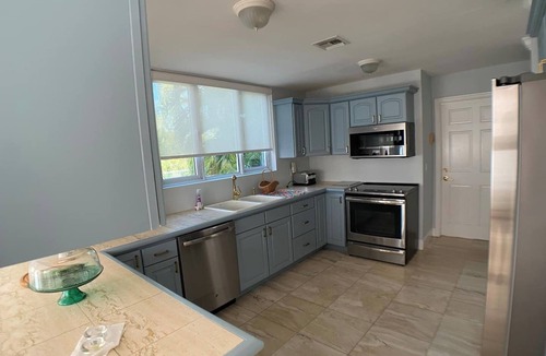 Smith's Point House | 4 Be/3.5 ba Pretty Bahama Style Home on Blue Canal