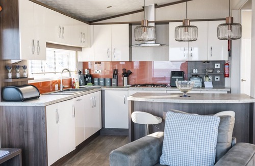 Mudeford Ski Chalet | A relaxing coastal lodge with uninterrupted views across to the Isle of Wight and The Needles.