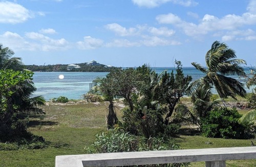 Green Turtle Cay Cottage | Adorable Pink cottage-OCEAN FRONT on Coco Bay with a dock. 15% SUMMER DISCOUNT!