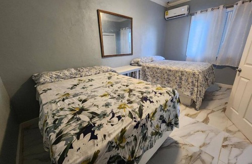 Rolle Town Cabin | Andros Waterside Retreat One-Bedroom Suite 2 full beds