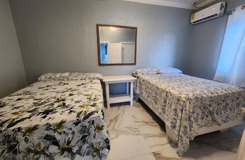 Rolle Town Cabin | Andros Waterside Retreat One-Bedroom Suite 2 full beds