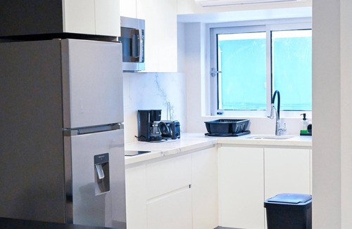 Westward Villas Subdivision Apartment | Bahama Mama Suite - Cable Beach Charming studio in beautiful Nassau with AC