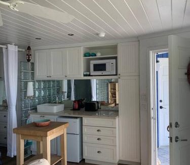 Westwind Apartment | Beach'nBarefoot (Love Beach) - nestled on the beach