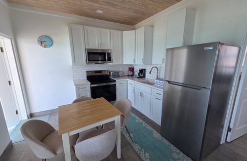 Spanish Wells House | Beachfront Bliss: a beautiful duplex on a private beach on Russell Island