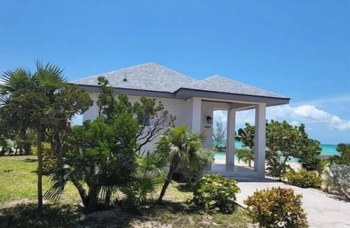 New Bight House | Beachfront Bungalow In Paradise: Papaya Villa