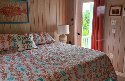 Hope Town Villa | Beautiful home with wifi, tv, A/C, private dock, & backup generator power