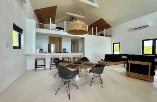 Gregory Town House | Big Pink: mid-century modern 2bedroom oceanfront home on cliffs of Gregory Town