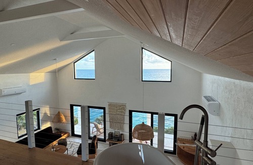 Gregory Town House | Big Pink: mid-century modern 2bedroom oceanfront home on cliffs of Gregory Town