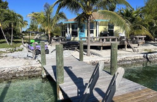 Treasure Cay House | Big Yellow House with Deep Water Dock with Power, and Tesla Backup Power.