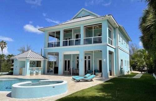 Coral Harbour House | Blue Birds Beach House, comfortable beach readaway with a heated pool