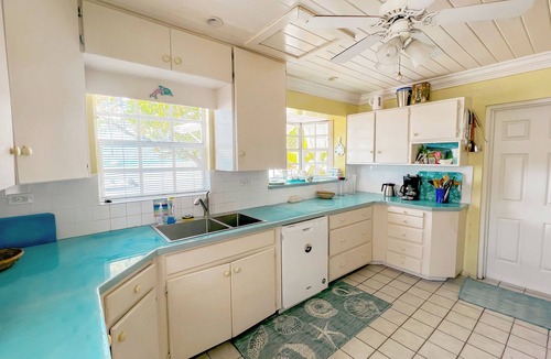 Dunmore Town House | Blue Dolphin - Waterfront, 4 Sunset Decks, Dock, 5+ Bedrooms, Enclosed Garden