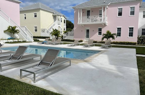 Palm Cay Condo | Breathtaking Pool Front 3-Bedroom Condo, Just 8-Min Walk to Pristine Beach!