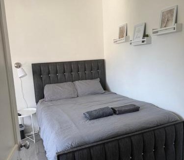 Gorgie Apartment | Bright bedroom with king side bed and share bathroom