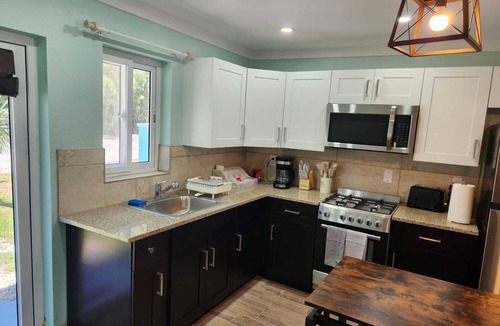 Rock Sound Apartment | By the Bay - Brand New Apartment, Steps to the Sea, Walk to Town