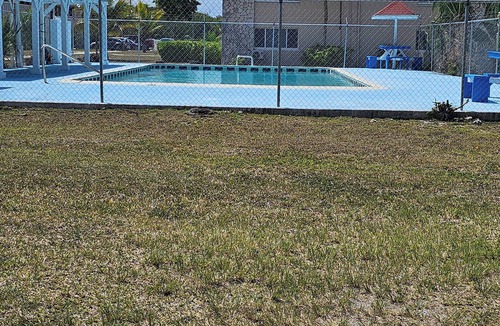 Bahamas Terrace Apartment | Centrally located 2-bed unit w/washer/dryer, Wi-Fi, pool, and nearby dining.