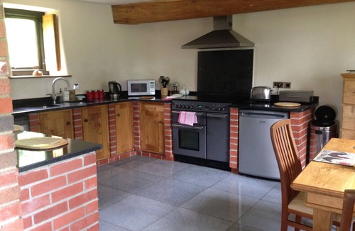 Worlington Cottage | Character Cottage Between Exmoor & Dartmoor on a 15th-Century Farm with Pool