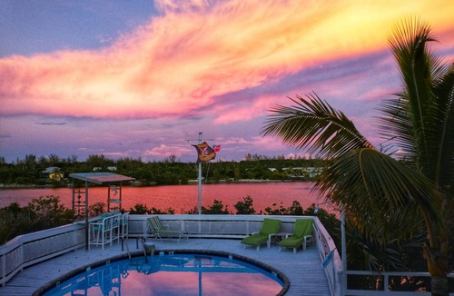 Great Harbour Cay House | Charming and Secluded Home on the Bay with Fresh Water Pool, Dock, Views.