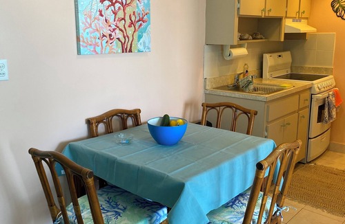 Williams Town Condo | Charming beach front condo, Freeport ,Coral Beach, with AC/WiFi, salon/spa, pool