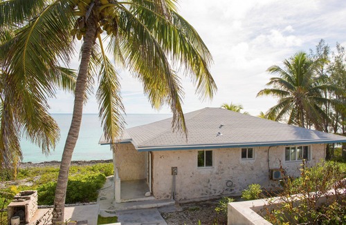 Rainbow Bay House | Charming Cottage Directly on Calm Caribbean, Best Ocean Views!