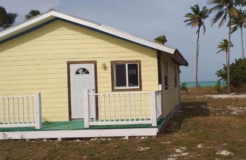 Little Creek Villa | Cheerful one bedroom villa with a patio.