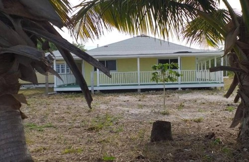 Little Creek Villa | Cheerful one bedroom villa with a patio.
