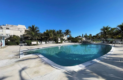 Williams Town Condo | Coral Beach Private Modern Beachfront Condo
