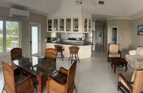 Coral Harbour Condo | Coral Condominium - Tranquil 2-bedroom right on our private beach.