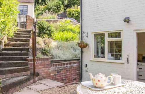 Ironbridge Cottage | CottageSleeps2-Fireplace-ValleyView-Patio-Garden