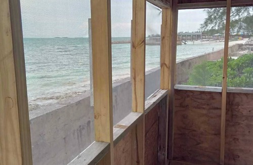 Andros Town House | Cozy cottage with AC, Washer & dryer, spacious, situated on the beach.