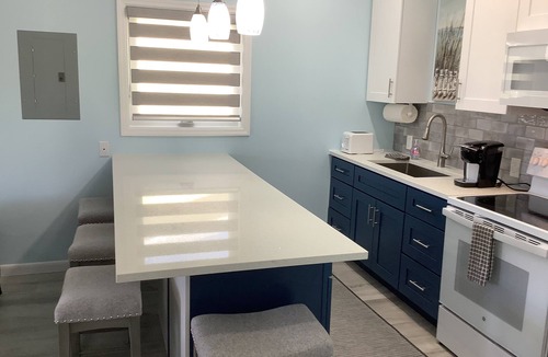Bahama Reef Apartment | Cozy private green studio cottage on water free floating dock at your doorstep