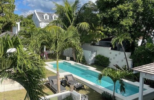 Dunmore Town House | Crown Affair: Village Compound on Charming Lane with 40' Pool & Sunset Views